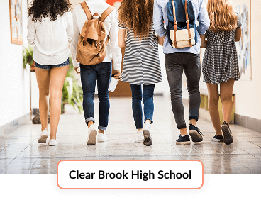 Students walking the hallway at Clear Brook High School: the Clear Creek ISD campus assigned to Midline for grades nine through twelve.