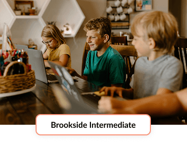 tudents working at laptops in Brookside Intermediate: the Clear Creek ISD campus serving Midline students in grades six through eight.