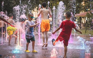 Children playing in the fountain