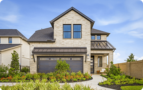 Two-story cream brick new construction home at Midline in Webster, TX with a covered entry and landscaped front walk.