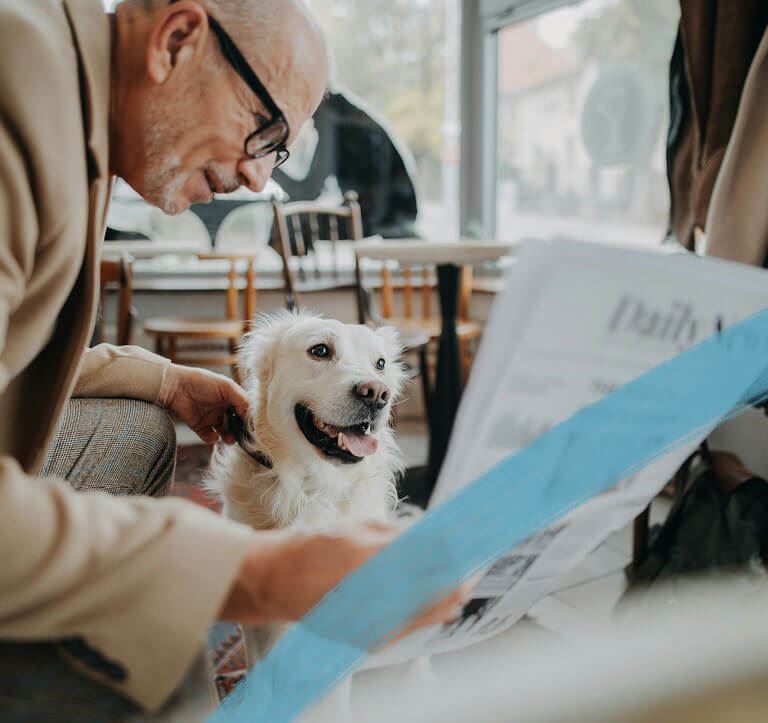 Dog and newspaper | Midline community near Houston, TX